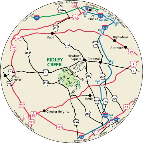 A circular map that shows the roads surrounding Ridley Creek State Park